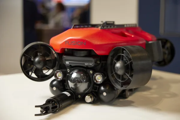 SRS FUSION ROV in red with Reach Robotics grabber